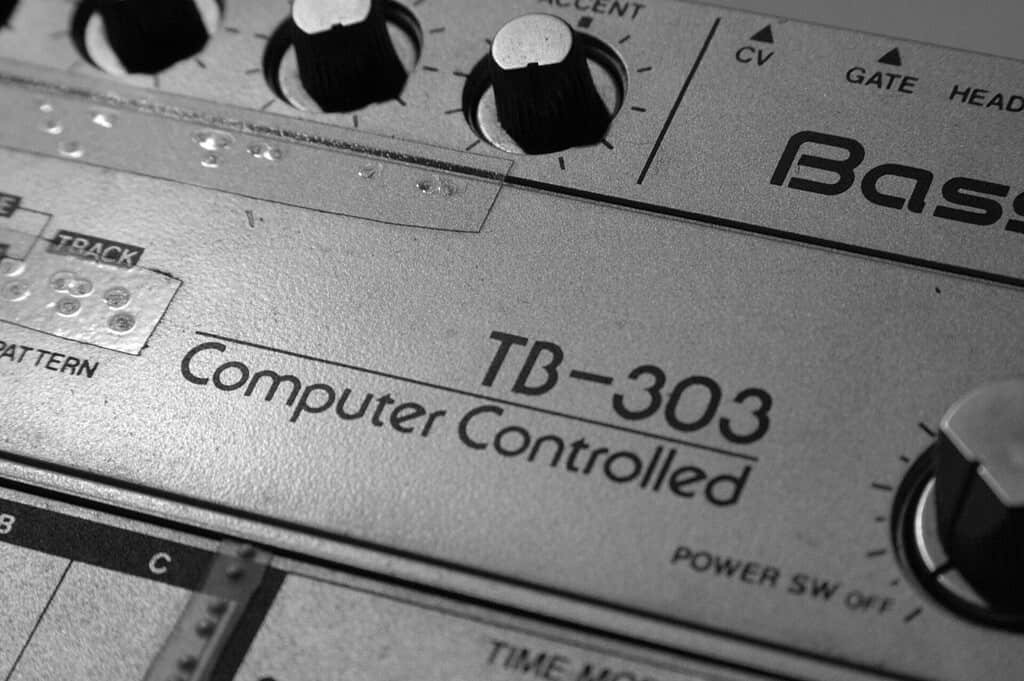 Techno Genres and Subgenres: 12 Types of Techno Explained (2026) 2 Close-up of a 1982 Roland TB-303 Bass Line, the synth behind acid techno