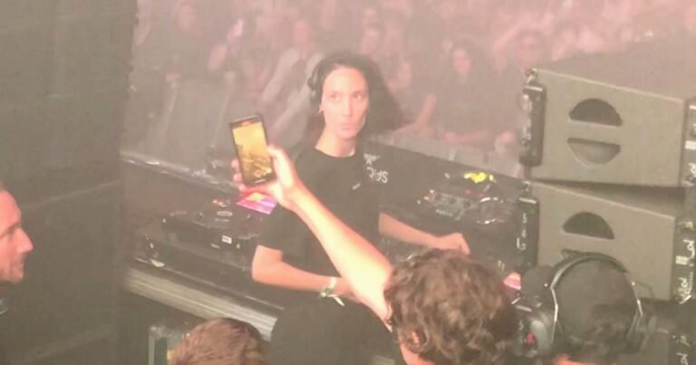 Amelie Lens playing behind the decks at Ikarus Festival in 2022
