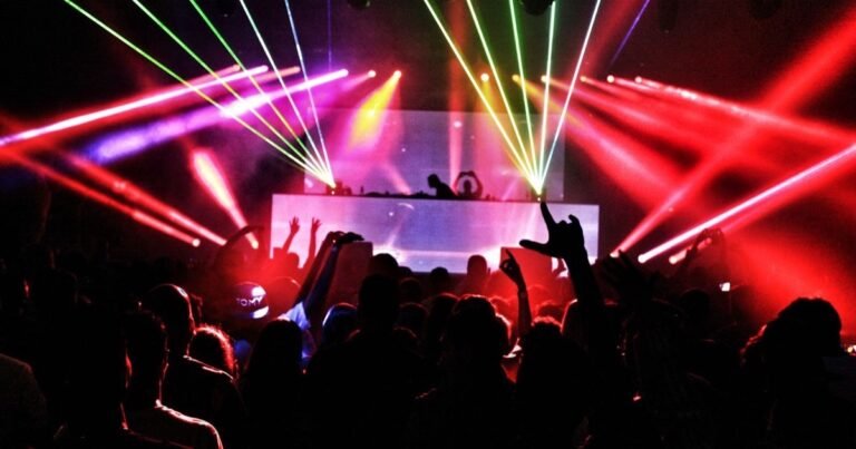 Crowd and laser show at an electronic music club night