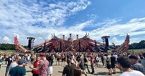 The Defqon.1 RED main stage and crowd under a hot clear sky in Biddinghuizen, Netherlands The Defqon.1 RED main stage and crowd under a hot clear sky in Biddinghuizen, Netherlands