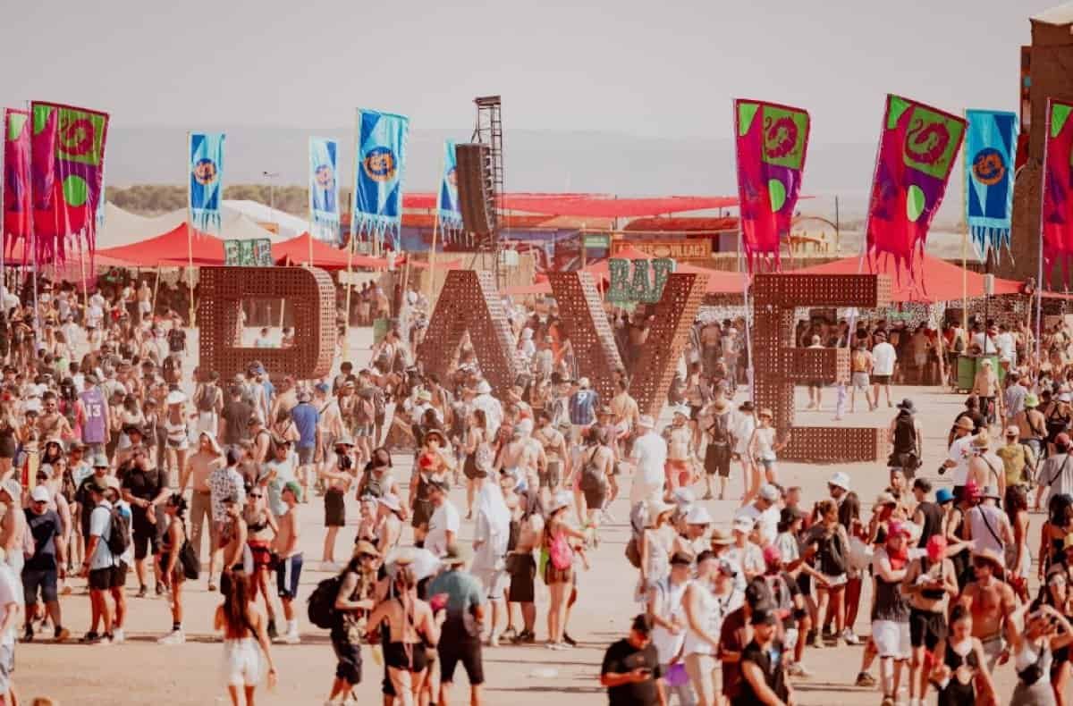 Monegros Desert Festival 2026 Announces Its First Simultaneous Double Closing 1 Giant RAVE letters and festival crowd at Monegros Desert Festival