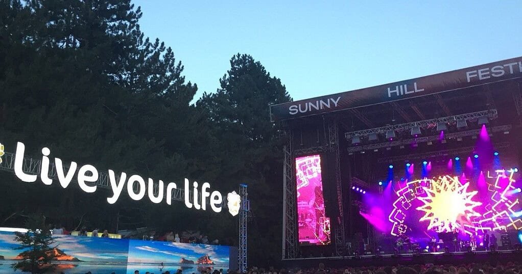 Sunny Hill Festival main stage lit up at dusk in Prishtina, Kosovo