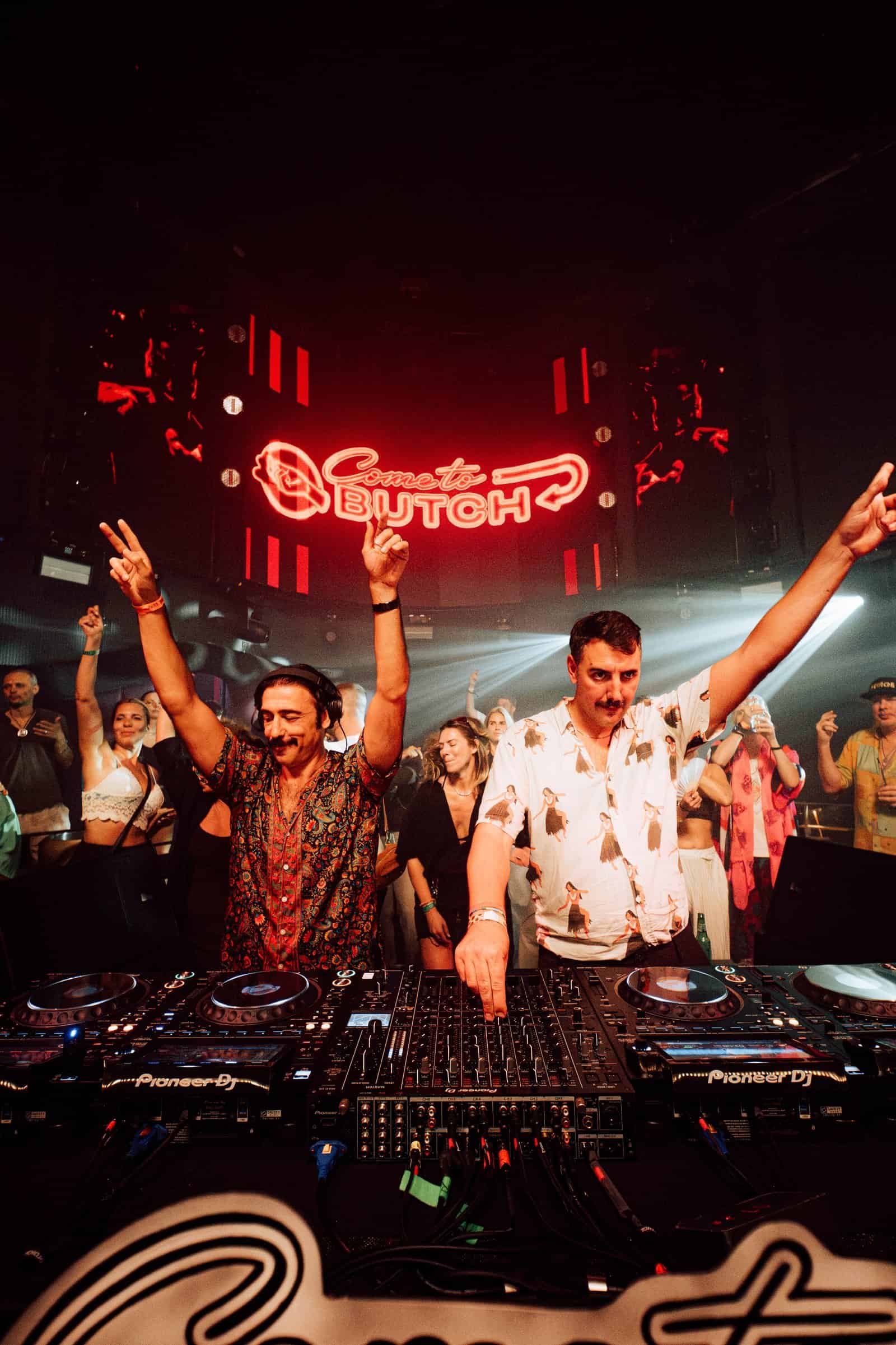 Butch Launches Come To Butch at Chinois Ibiza for Three Dates Only 1 Butch playing back to back at Chinois Ibiza under the Come To Butch neon sign
