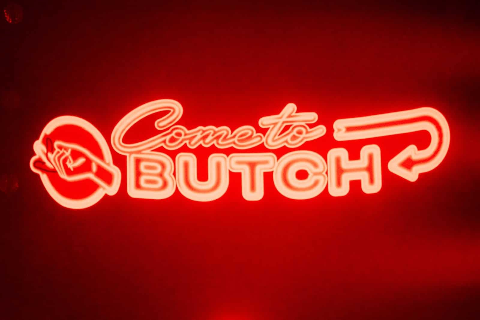 Come To Butch red neon sign Come To Butch red neon sign