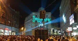 Crowd at Solomun's free street show in Sarajevo with his name projected on a building Crowd at Solomun's free street show in Sarajevo with his name projected on a building