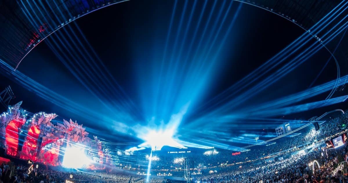Crowd and light beams at the UNTOLD 2026 main stage in Cluj-Napoca, host of Europe's first on-site festival breast cancer screening Crowd and light beams at the UNTOLD 2026 main stage in Cluj-Napoca, host of Europe's first on-site festival breast cancer screening