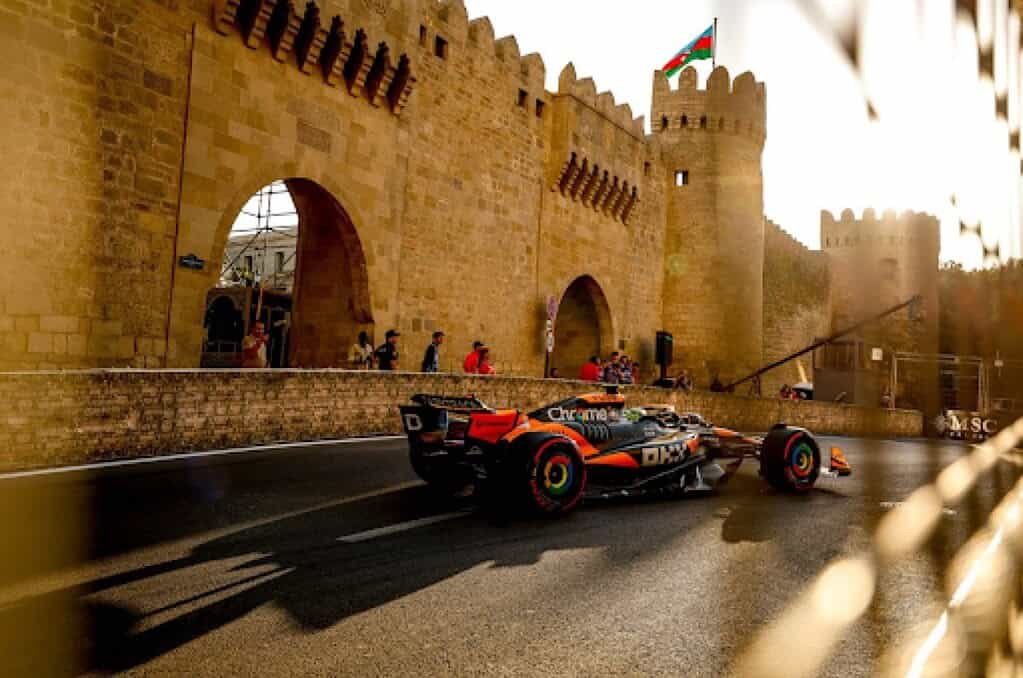 Formula 1 car passing the Old City walls on the Baku City Circuit during the Azerbaijan Grand Prix Formula 1 car passing the Old City walls on the Baku City Circuit during the Azerbaijan Grand Prix