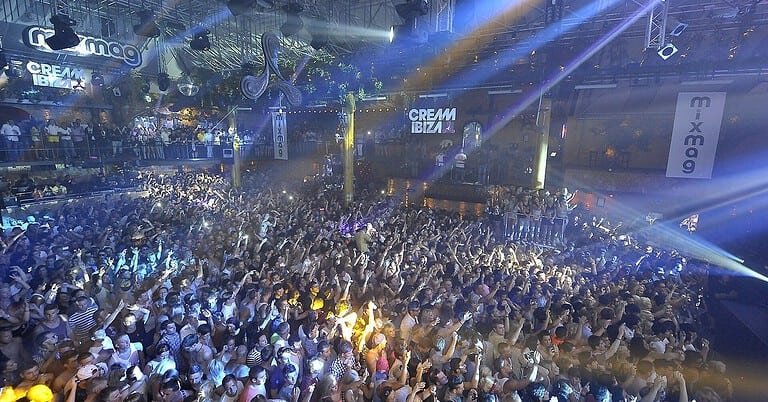 Packed dancefloor at Amnesia Ibiza during a Cream Ibiza opening party, one of the best Ibiza parties Packed dancefloor at Amnesia Ibiza during a Cream Ibiza opening party, one of the best Ibiza parties