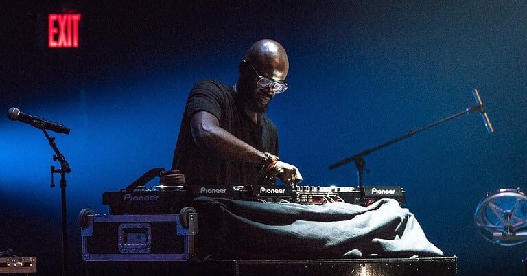 Black Coffee, the Grammy-winning South African DJ, mixing a live afro house set on Pioneer decks