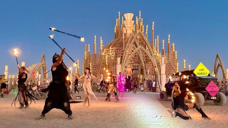 Fire dancers in front of the Temple at Burning Man 2024 in Black Rock City Fire dancers in front of the Temple at Burning Man 2024 in Black Rock City