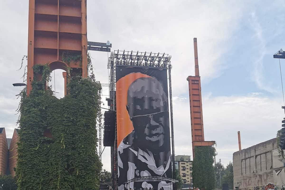 Carl Cox, 64, on a giant banner above the crowd at Kappa FuturFestival 2025 in Turin