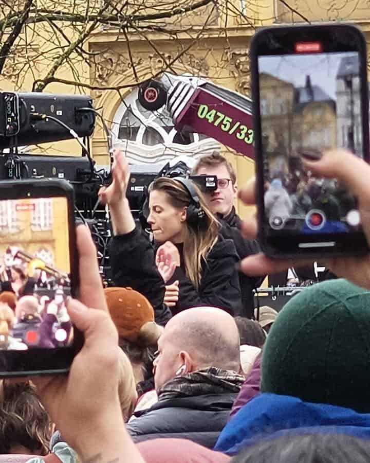 Highest-Paid Female Techno DJs 2026: Amelie Lens, Charlotte de Witte and 12 More 2 Charlotte de Witte playing a street set in Ghent in February 2026 as the crowd films on phones
