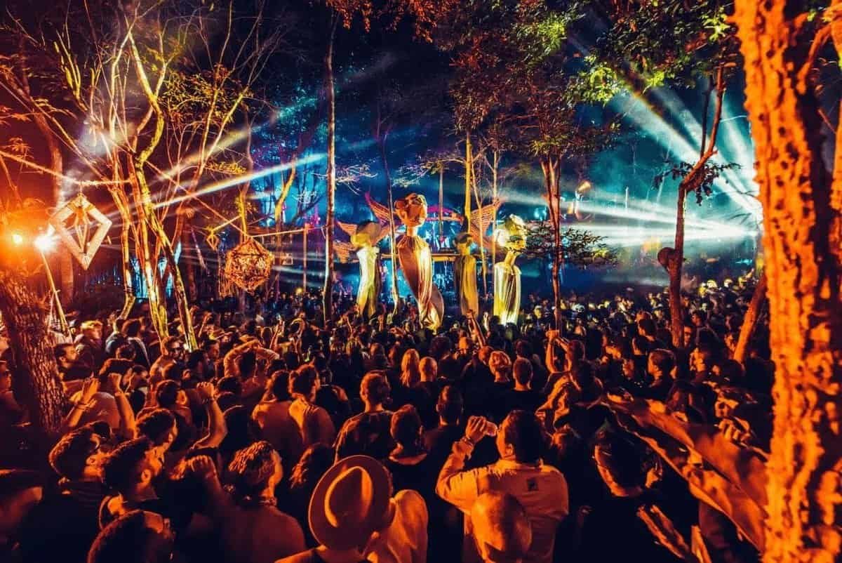 Nine Destination Festivals Worth Travelling For in 2026 and 2027 6 Crowd in front of a jungle stage with giant puppets and lasers at Day Zero Festival