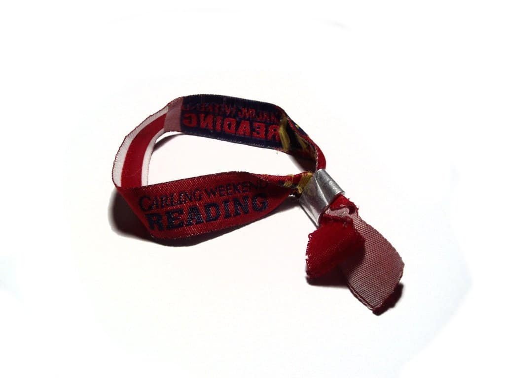 How to Remove a Festival Wristband Without Cutting It 1 Fabric festival wristband with a metal clasp from Reading Festival