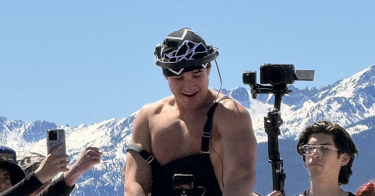 John Summit, 32, DJing outdoors at Vail ski resort in March 2026 with snowy mountains behind him