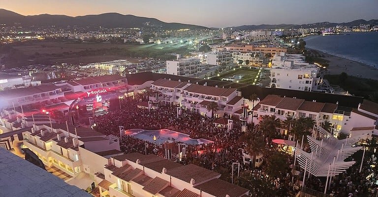 Packed open-air crowd at Ushuaia Ibiza on Playa d'en Bossa at dusk, one of the island's priciest club nights Packed open-air crowd at Ushuaia Ibiza on Playa d'en Bossa at dusk, one of the island's priciest club nights