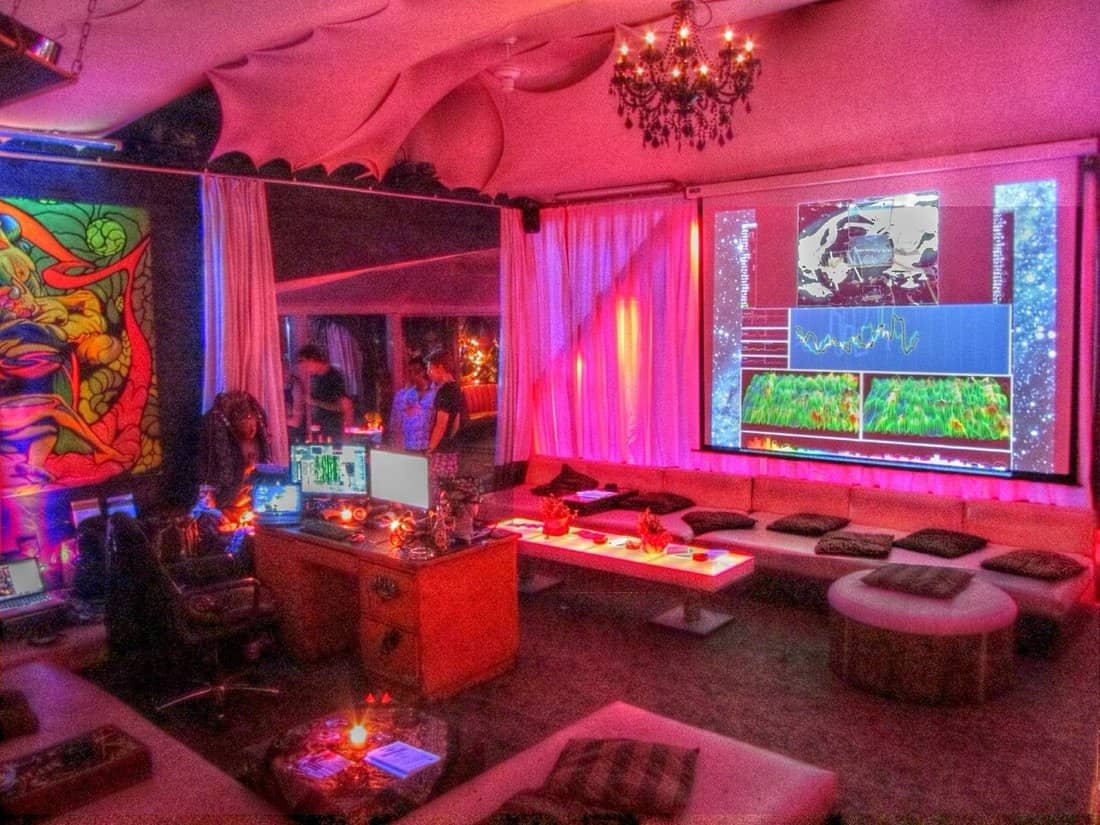Photos & Videos From Inside KitKatClub: Berlin's Most Infamous Club 2 Inside KitKatClub Berlin: pink lit lounge with chandelier, psychedelic paintings and daybeds