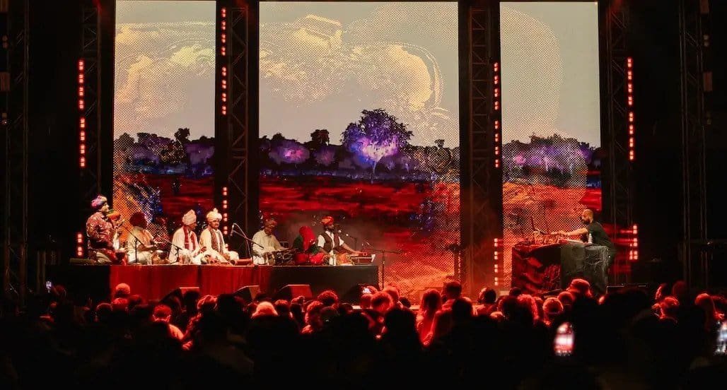 Nine Destination Festivals Worth Travelling For in 2026 and 2027 4 Live performance by Rajasthani musicians on stage at Magnetic Fields Nomads, India