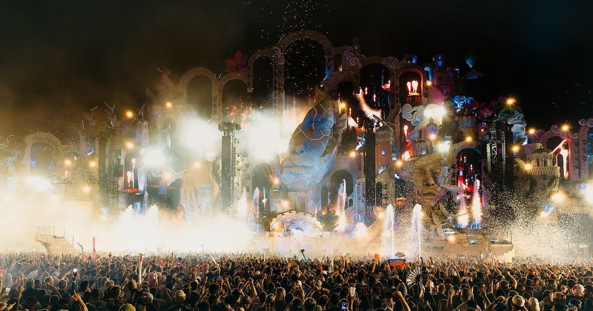 Tomorrowland main stage night show with fireworks, fountains and a packed crowd in Boom, Belgium, one of the most valuable festival tickets