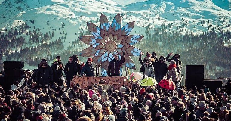 Rave On Snow crowd in front of a mountain stage on the Schattberg above Saalbach-Hinterglemm, one of Europe's winter techno festivals Rave On Snow crowd in front of a mountain stage on the Schattberg above Saalbach-Hinterglemm, one of Europe's winter techno festivals