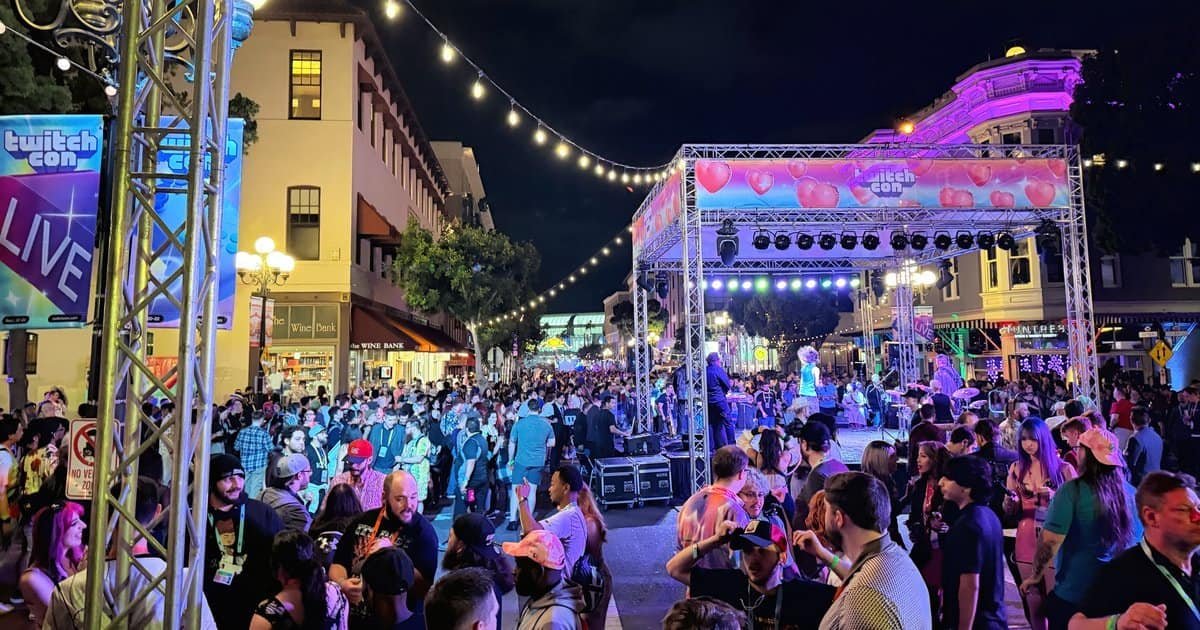 Crowd in front of the live music stage at the TwitchCon 2024 Block Party in San Diego, Twitch's real-world community event Crowd in front of the live music stage at the TwitchCon 2024 Block Party in San Diego, Twitch's real-world community event